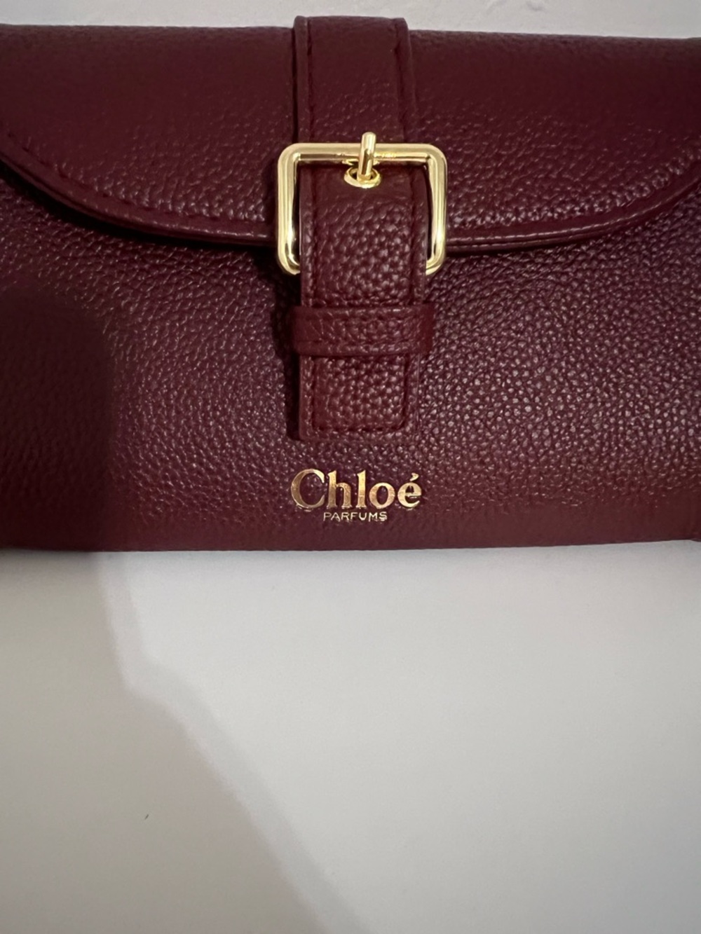NWOT Chloe Perfumes Burgundy Clutch with Gold Buckle Makeup Bag - Picture 2 of 9